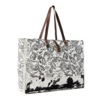 Wildfern Hide Western Weekender Bag for Women in ivory with hairon detail