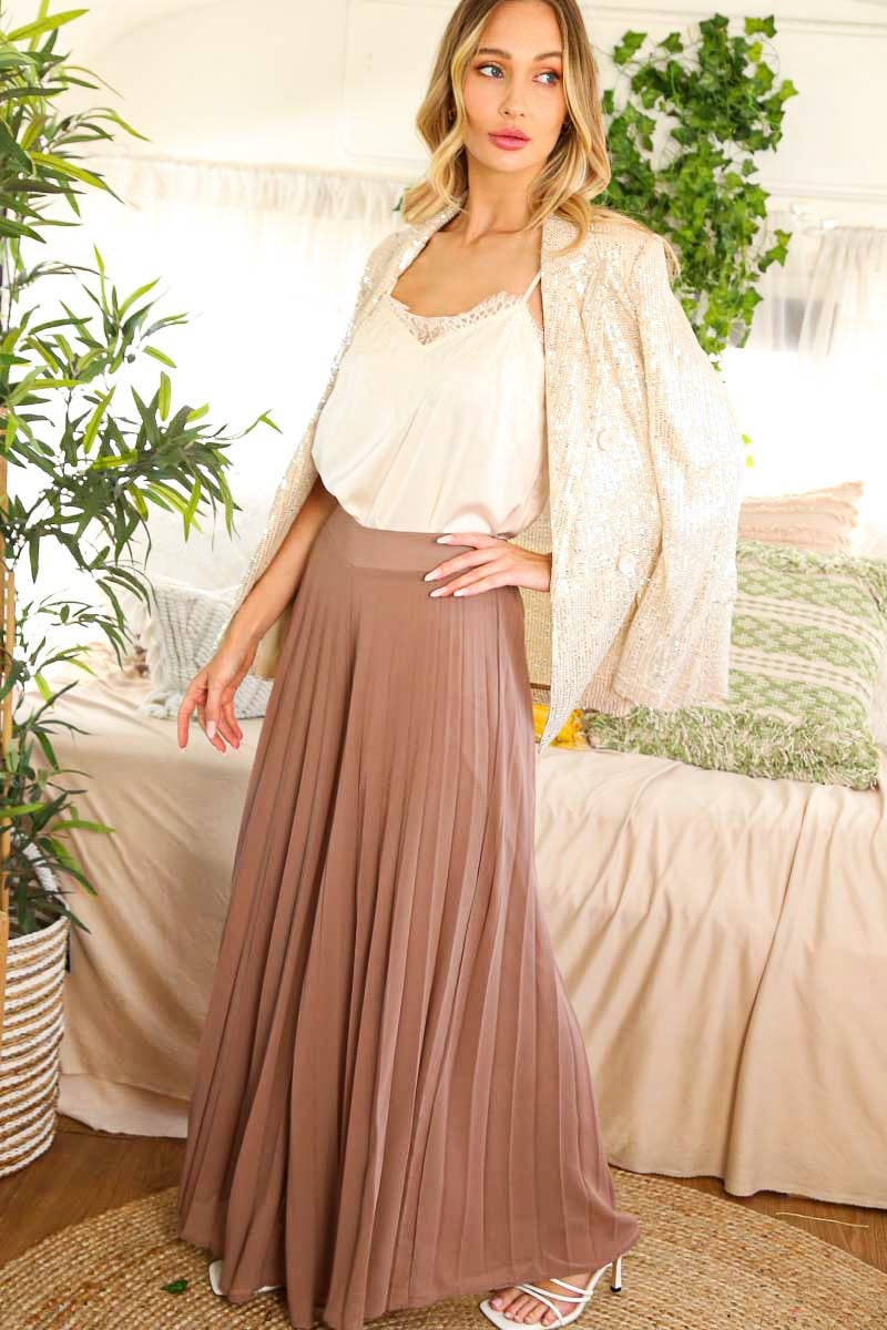 Full-length model view of Mocha palazzo pants styled with a light jacket