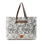Wildfern Hide Western Weekender Bag for Women in ivory with hairon detail