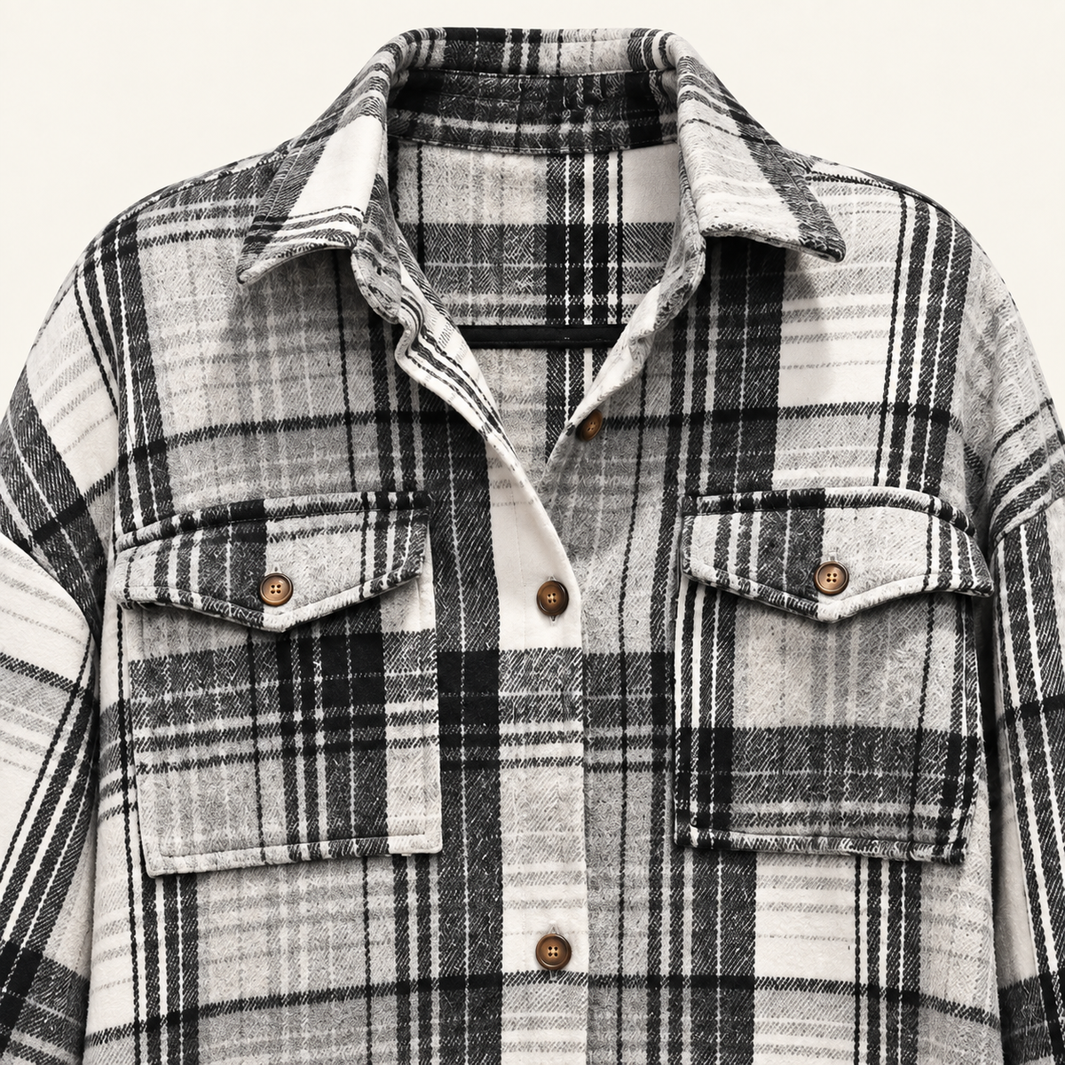 Jackson plaid shacket collar, pockets and button detail