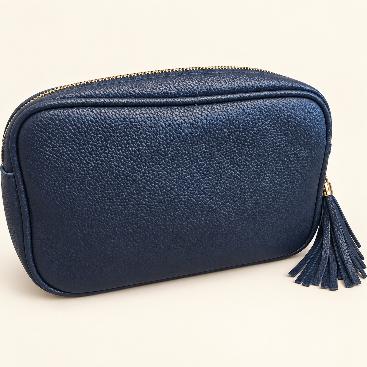 Maisie crossbody bag in Dark Blue, front view with matching tassel