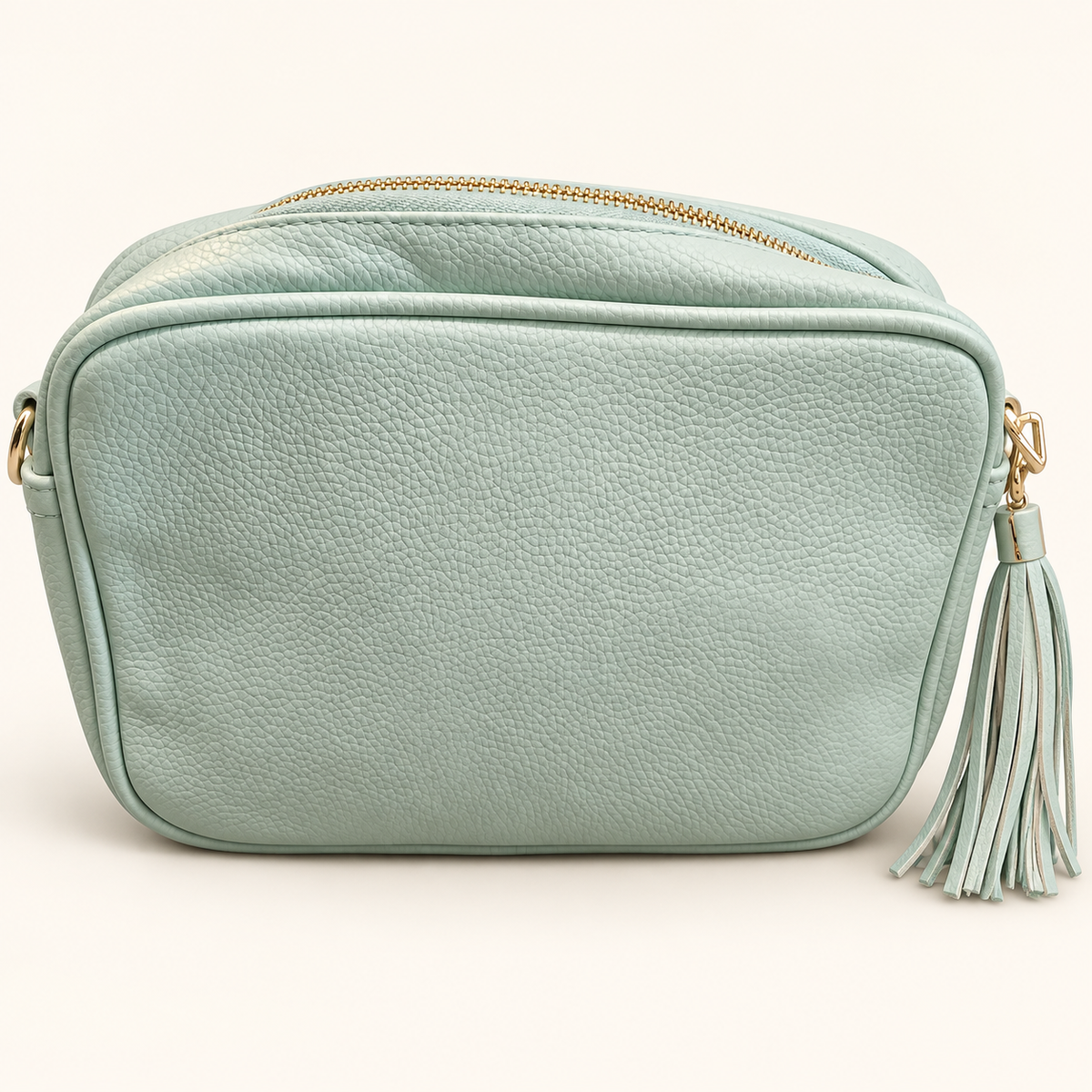 Maisie crossbody bag in Mint, front view with matching tassel and gold-tone hardware